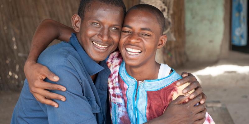 Two boys hugging eachother