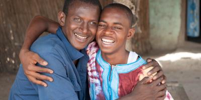 Two boys hugging eachother