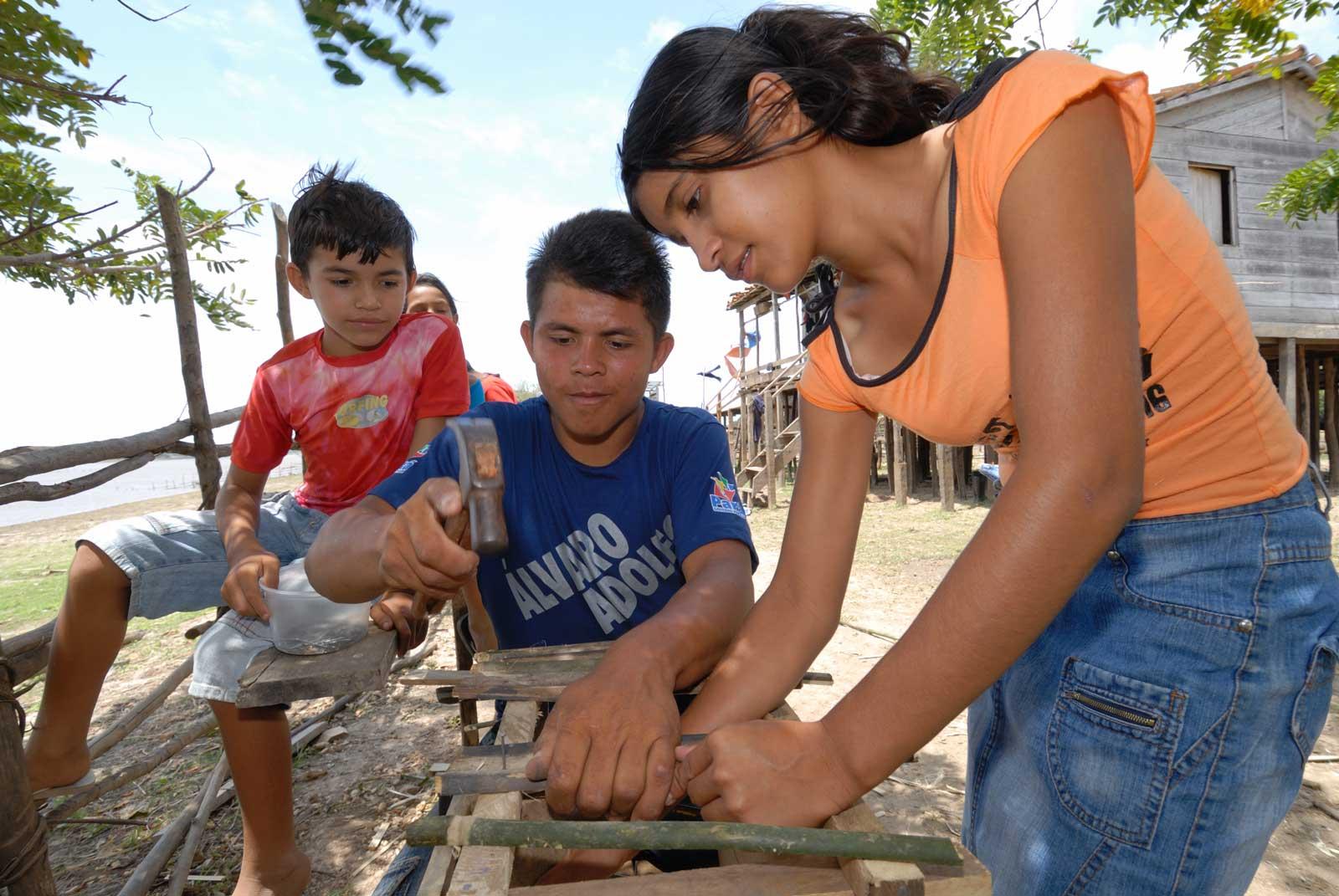 three children making a hut