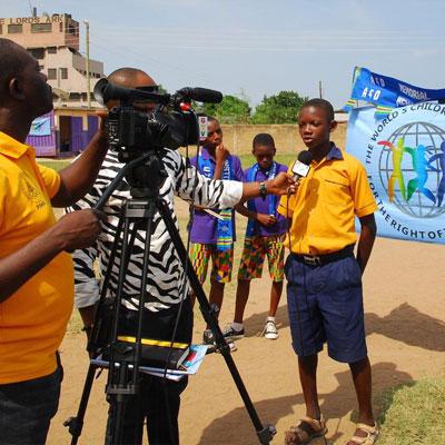 Boy interviewed by TV