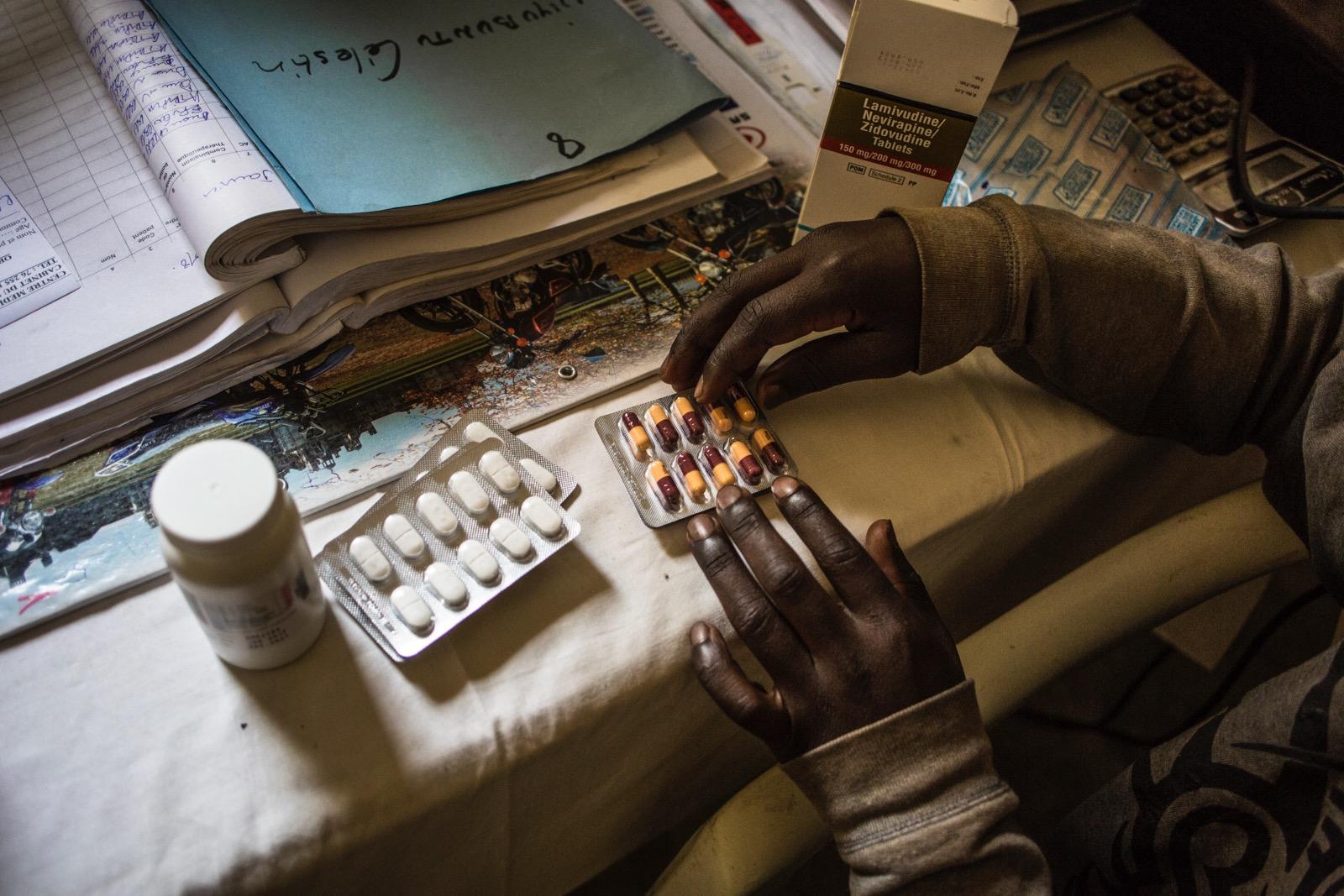 Some pills laying on a table.