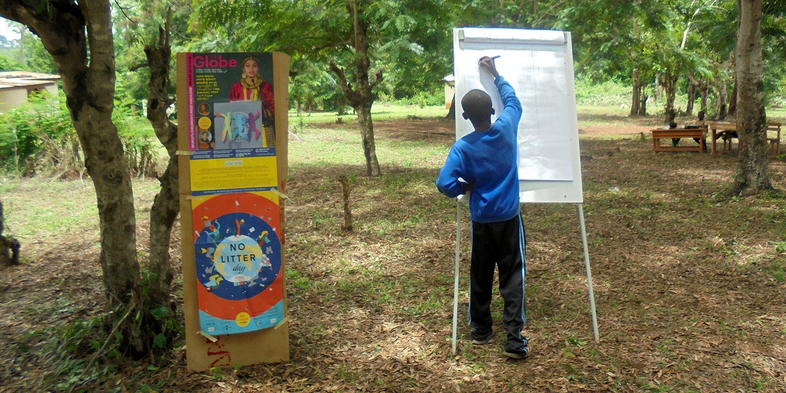 Boy counting litter 