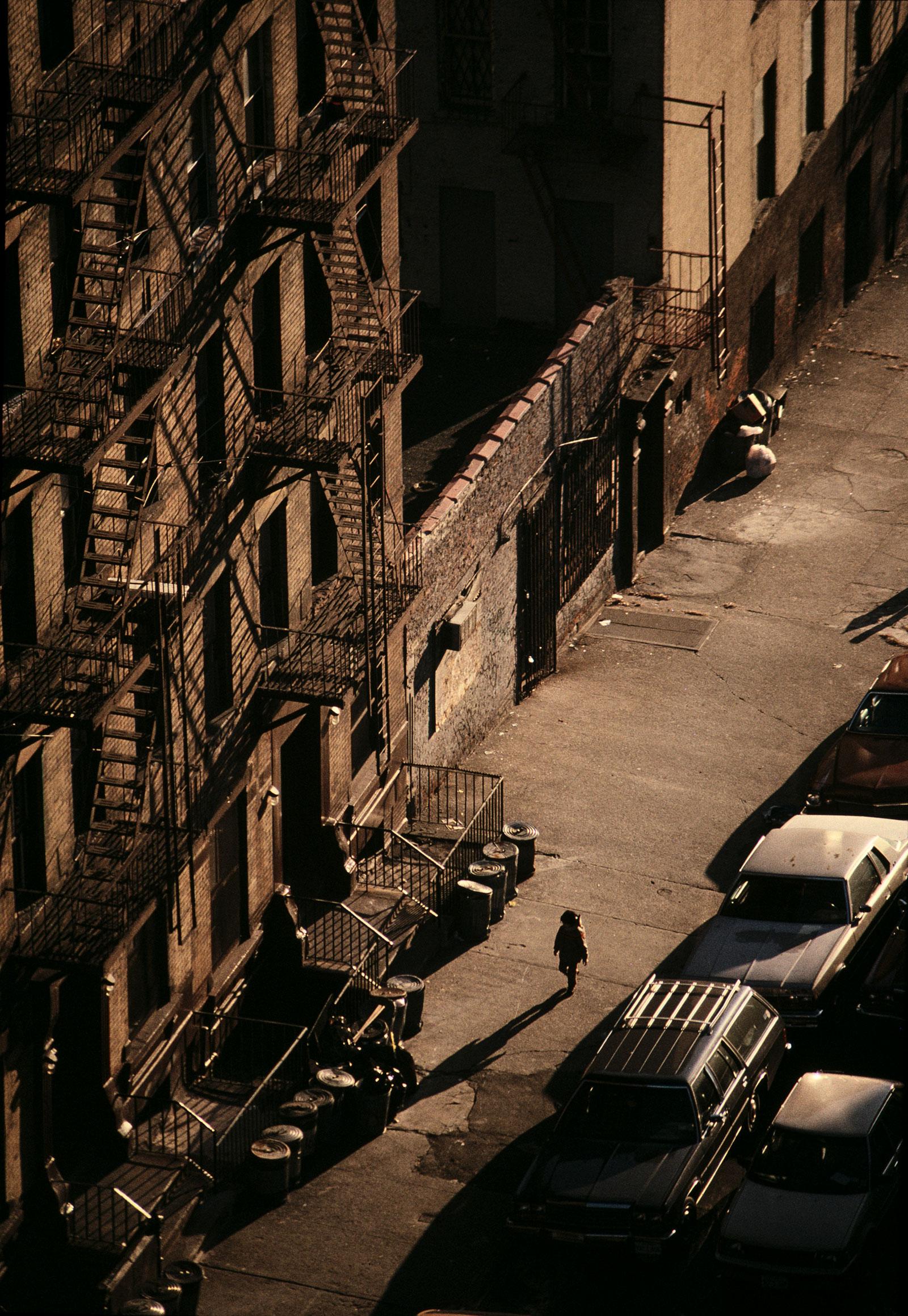 Person walking down a New York City street at night