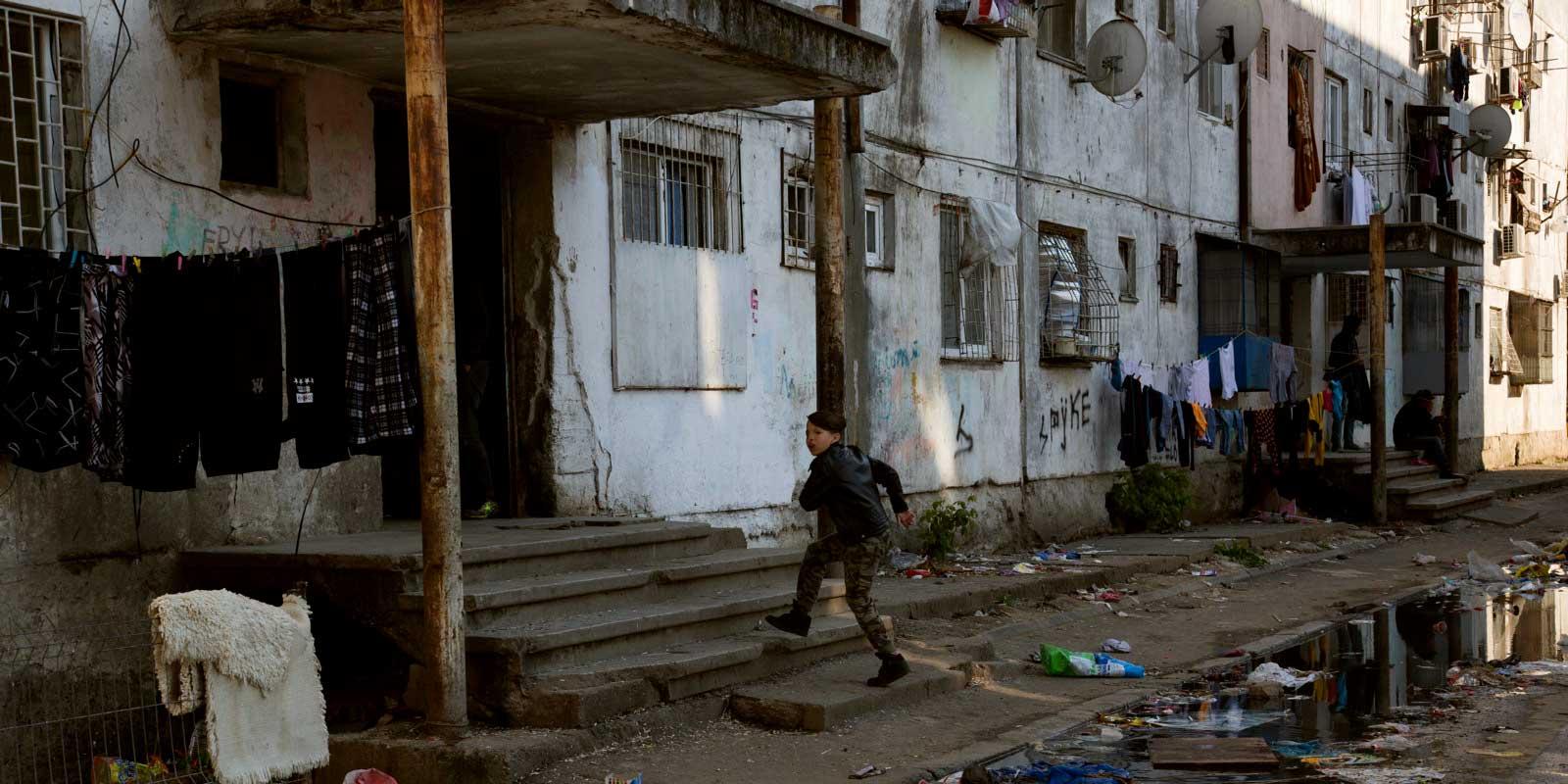 Child running in Ferenetari neighhbourhood