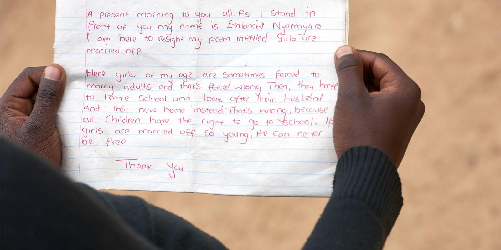 Hands holding a letter