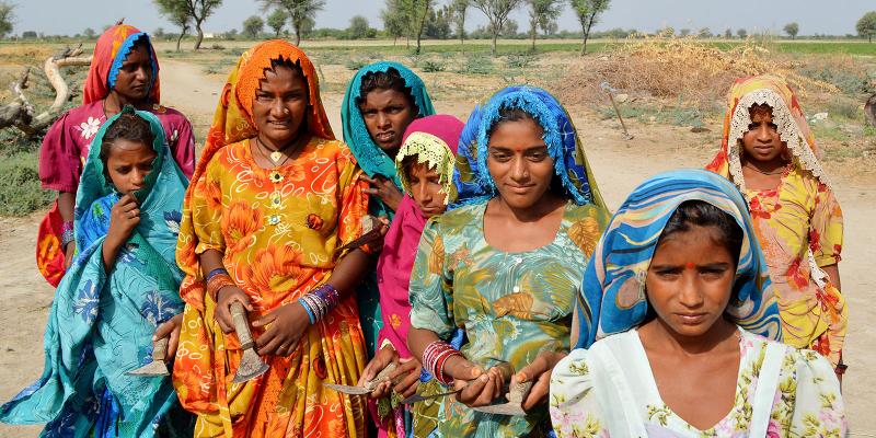 A group of girls in colourful clothing