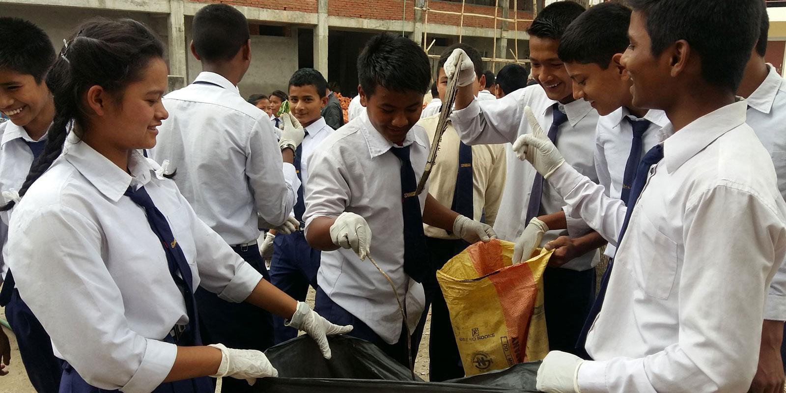 Children collecting trash