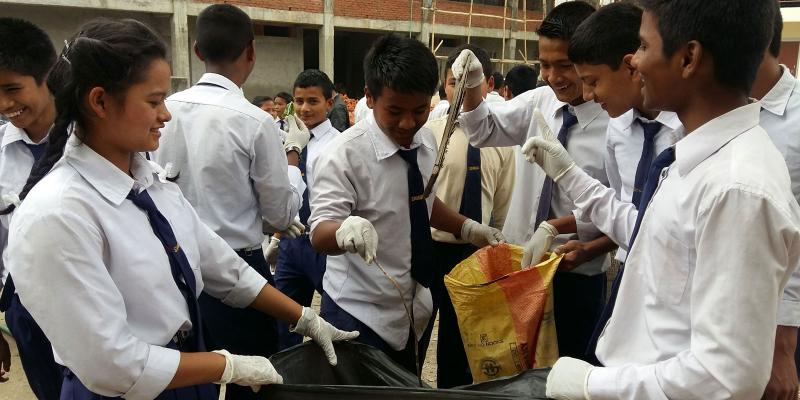 Children collecting trash