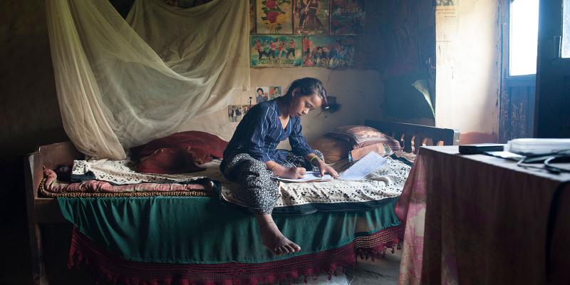 Girls studying at home