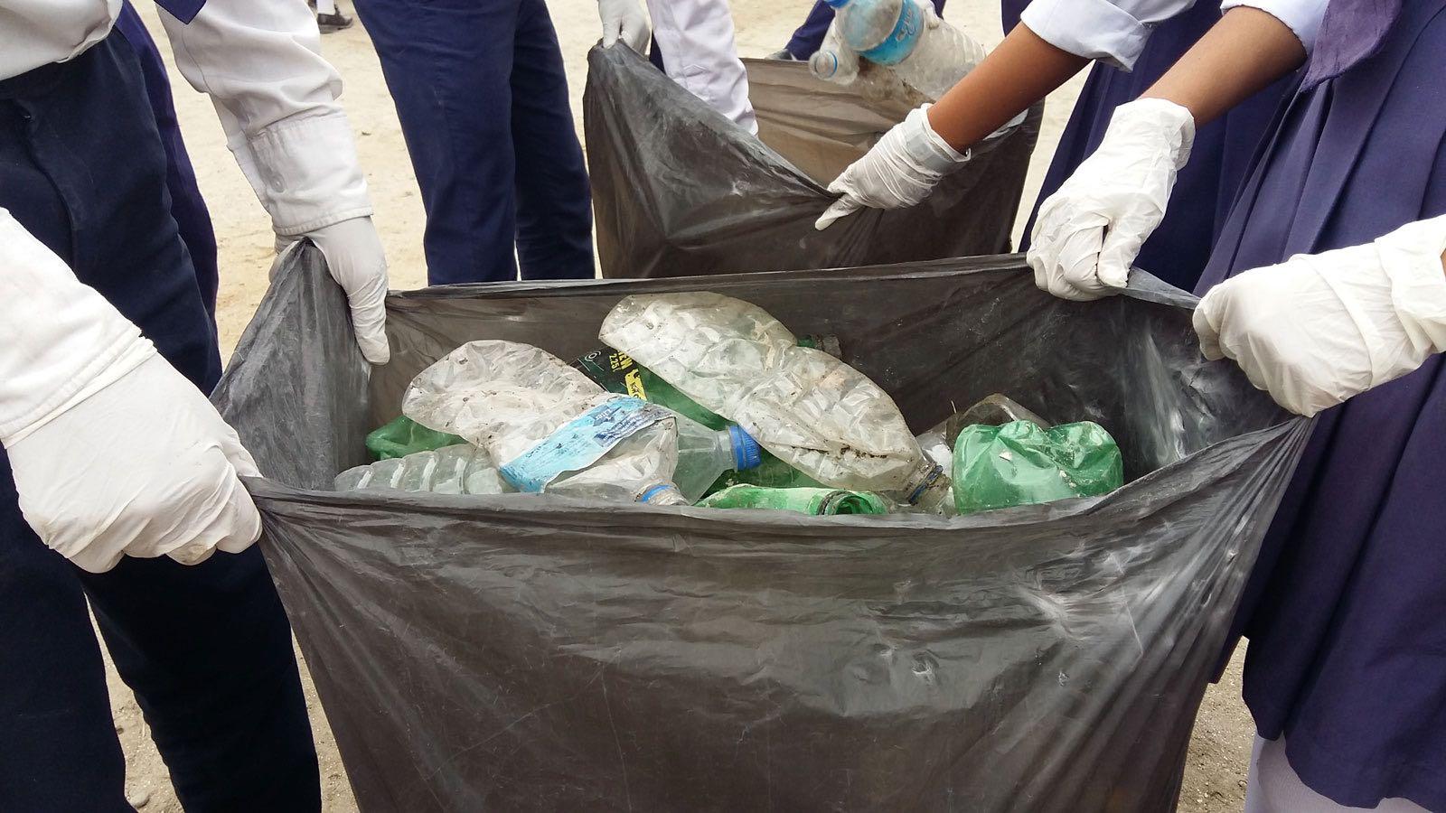 Children collecting litter