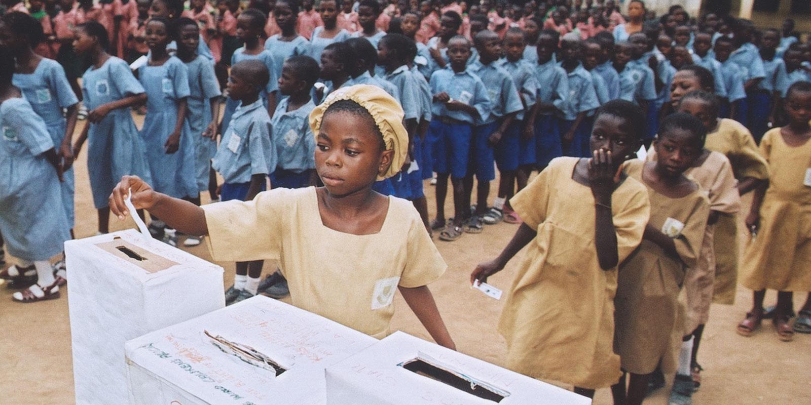 Girl voting in global vote