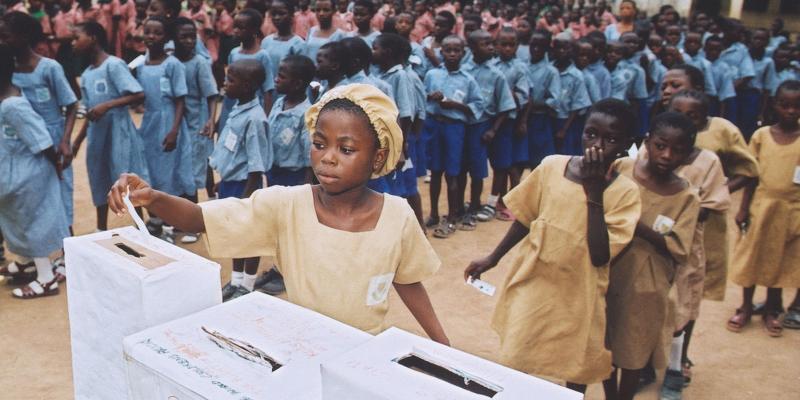 Girl voting in global vote