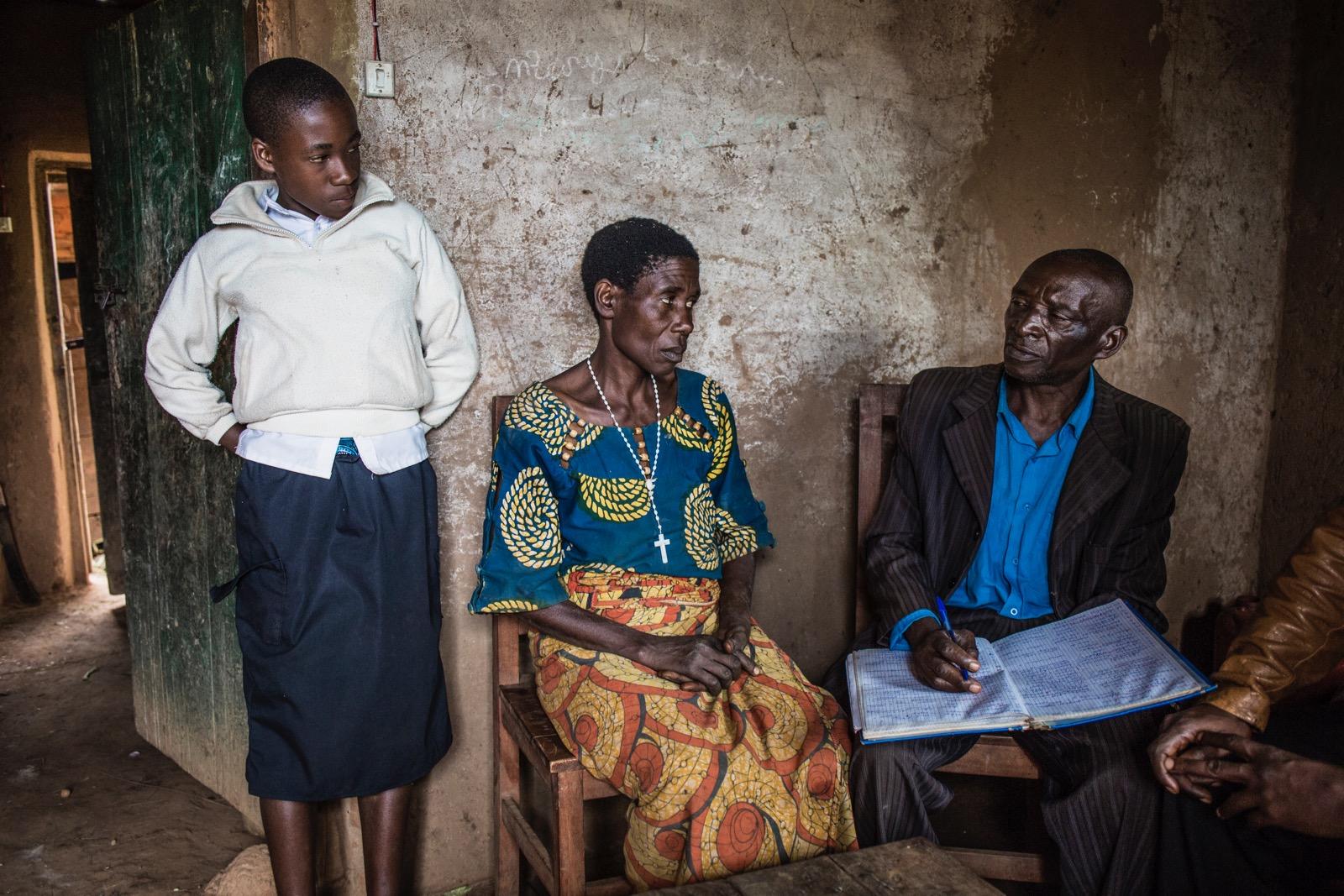 A picture of a man, a woman and a boy.