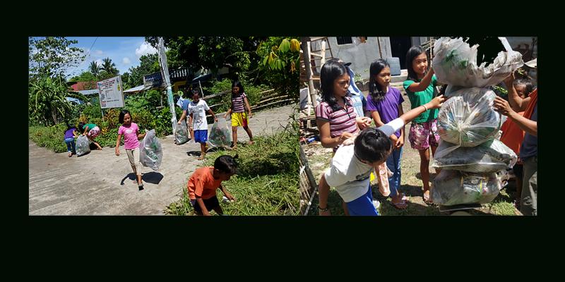 Children collecting and weighing litter
