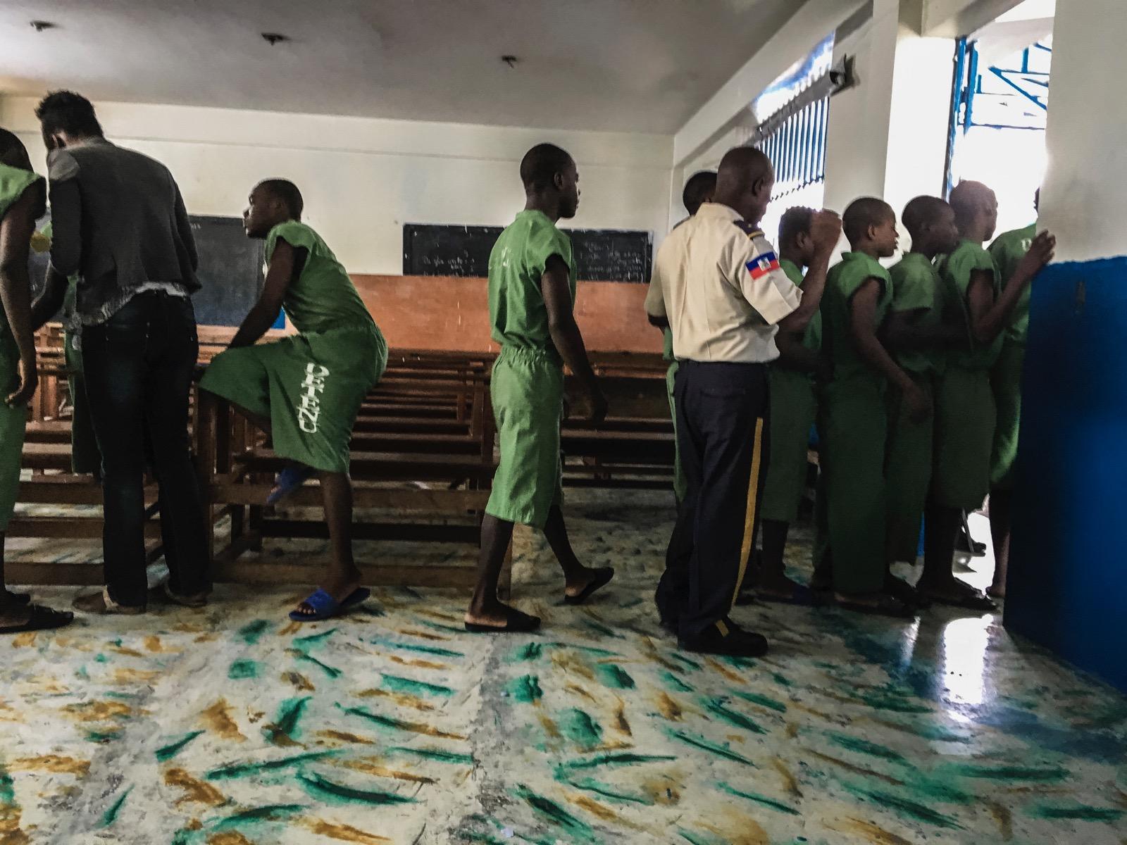 A group of men in a prison.