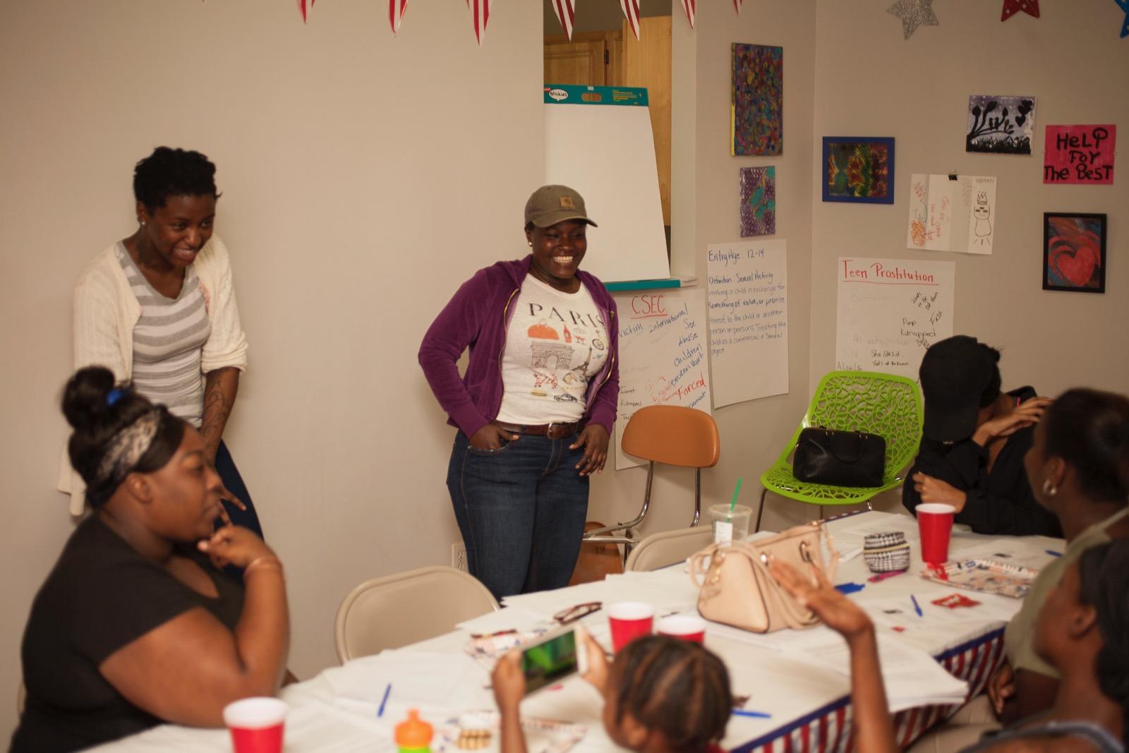 Shaquana holding workshop with girls