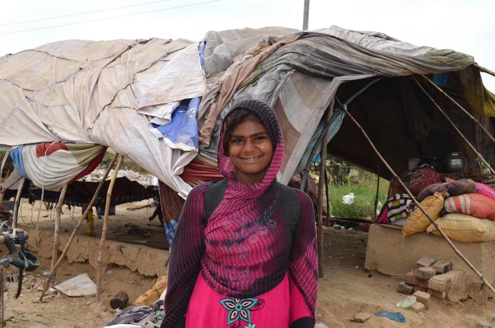 sidra in front of tent
