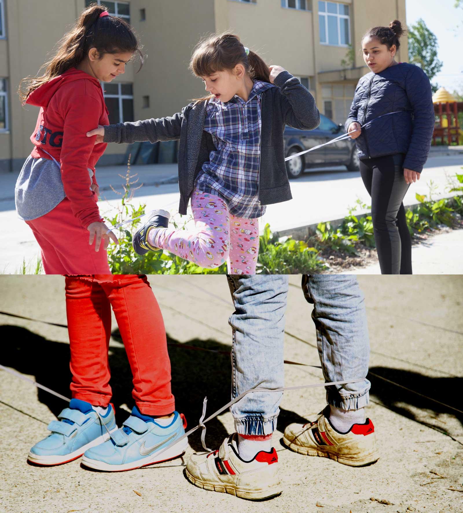 Girls playing with rubber band