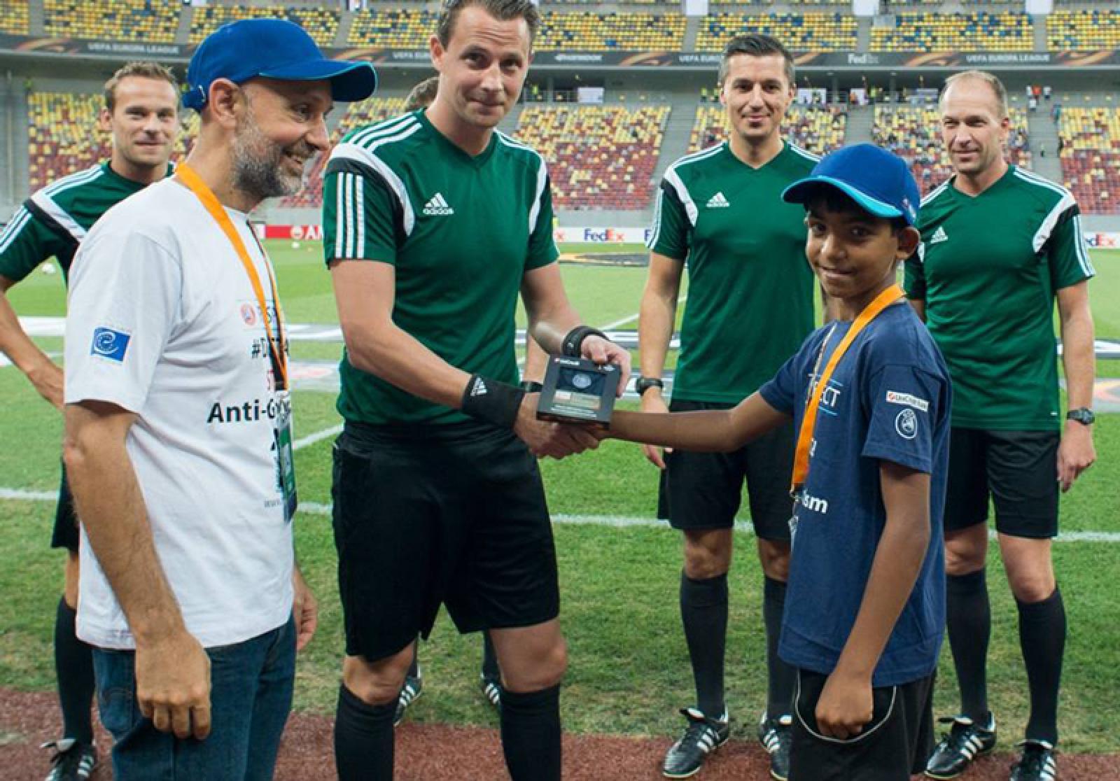 Valeriu and Bobo with football players.
