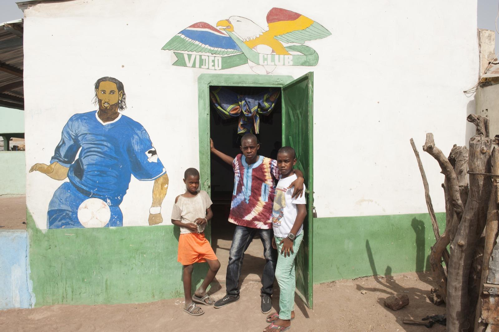 Boys at entrance to video club