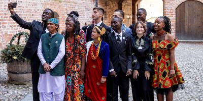 Children take a selfie together. 